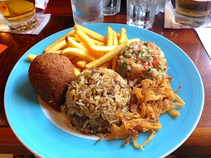 A fried cheese ball, rice and lentils and tabbouleh from Beduino.