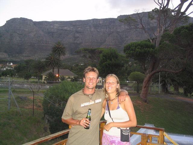 caz and craig with drinks and view of table mountain