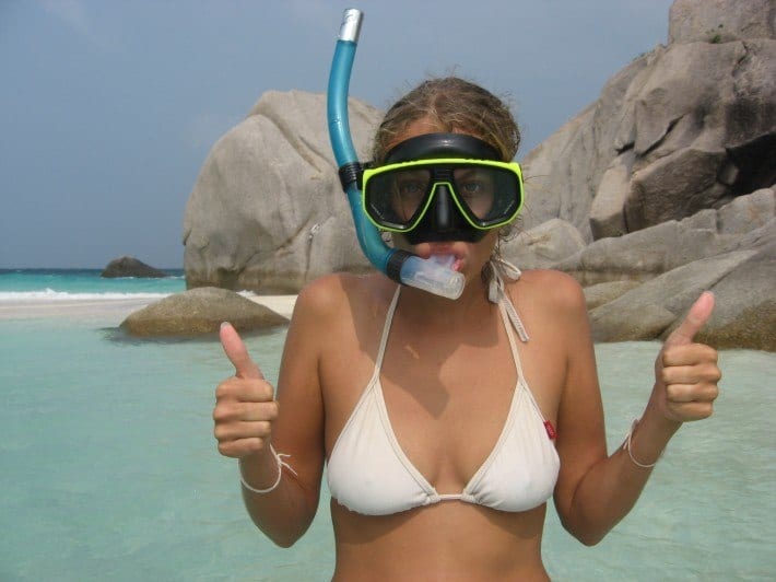 a woman wearing snorkeling gear