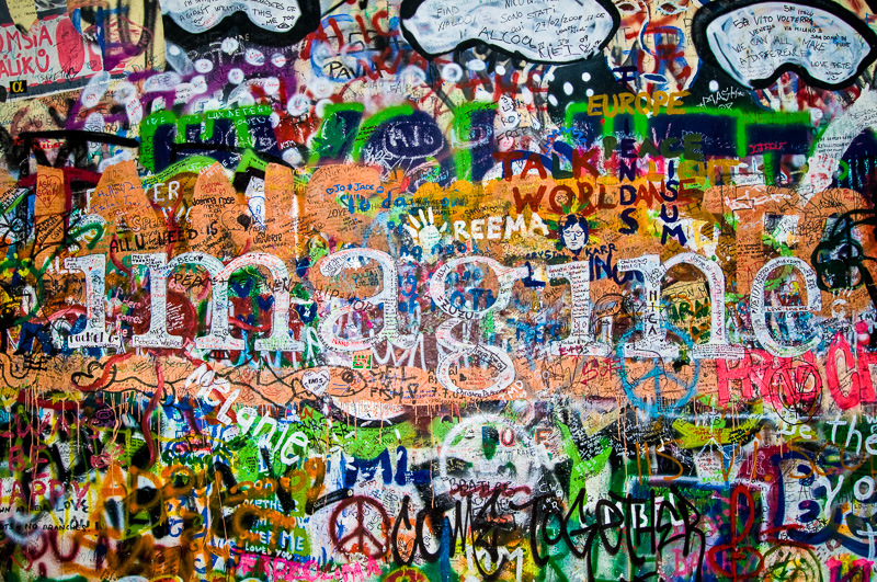 detail of the Lennon wall in Prague with words imagine
