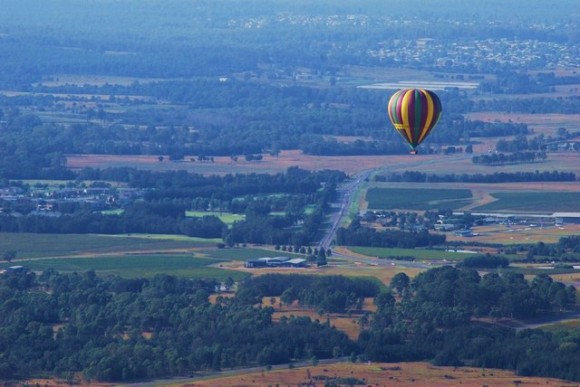 Hot air balloon in sky over hunter valley