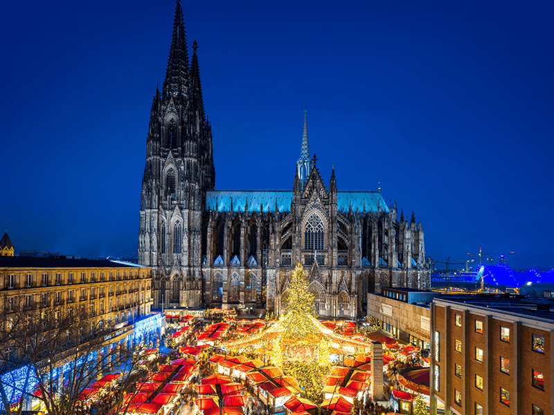 cathedral with christmas markets in front