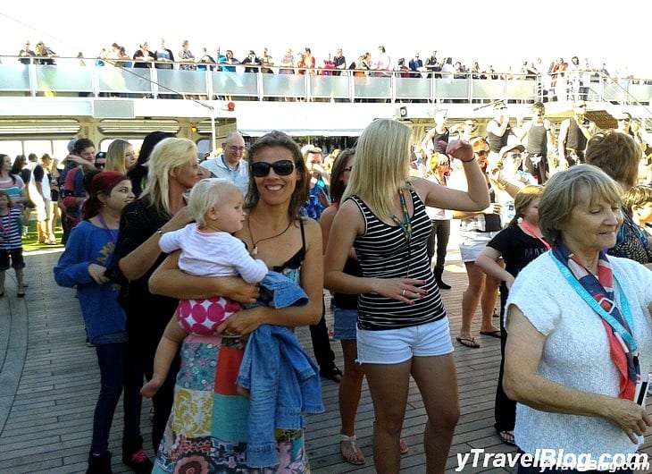people dancing on a boat deck