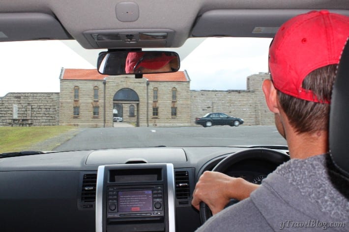 man driving up to entrance ofTrial Bay Gaol