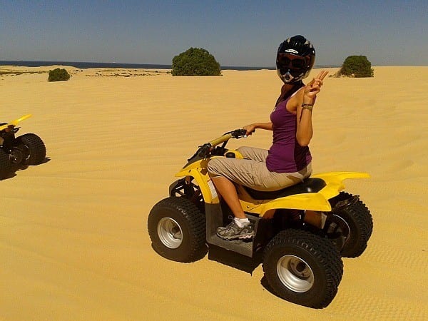 woman on dune quad bike
