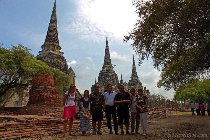 group of people posing in front of Ayutthaya historical park 