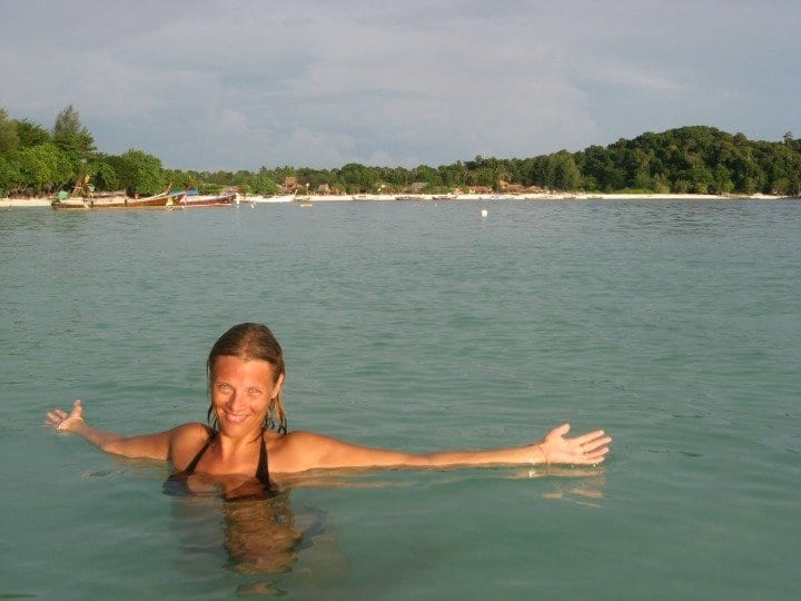 caz in water with arms open at koh lipe