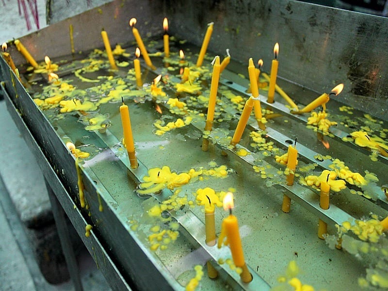 lit prayer candles