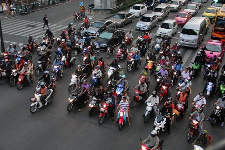 motorbikes waiting at traffic lights bangkok