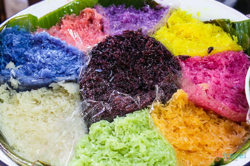 different colored rice on a plate