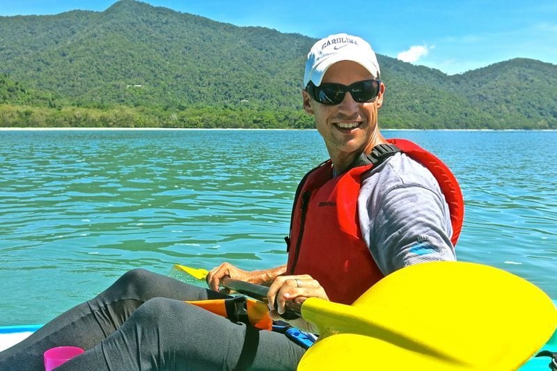 a man kayaking