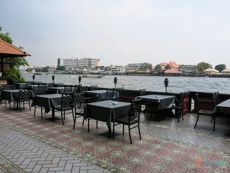 tables next to chaya praya river