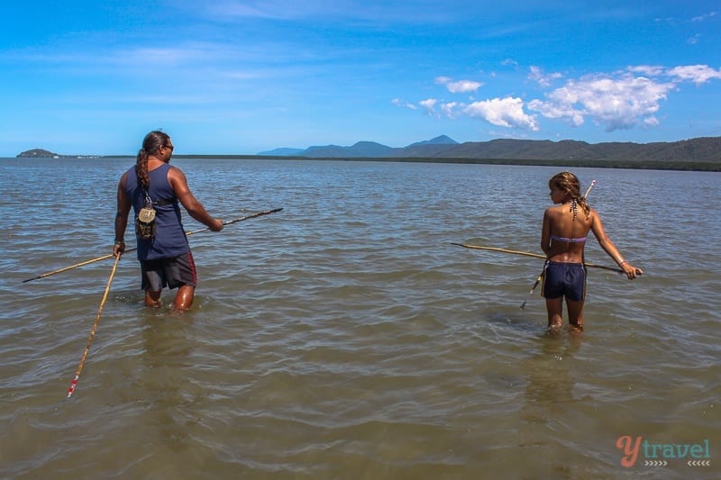 man and girl Spear fishing at Cooya Beach Cairns (1)