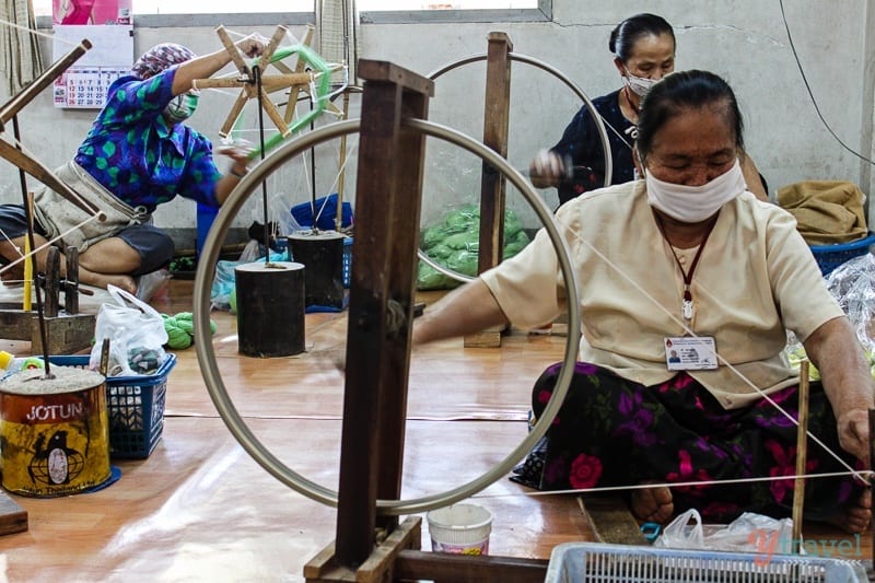 women sewing using wheels Doi Tung Royal Project Chiang Rai Thailand 