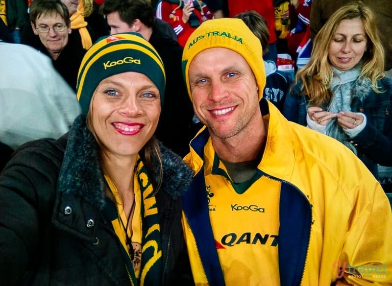 caz and craig posing to camera in australian wallaby gear