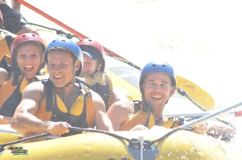people laughing successful  White h2o  rafting 