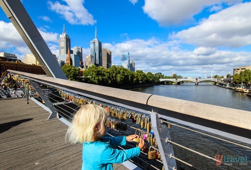 girl standing on a bridge