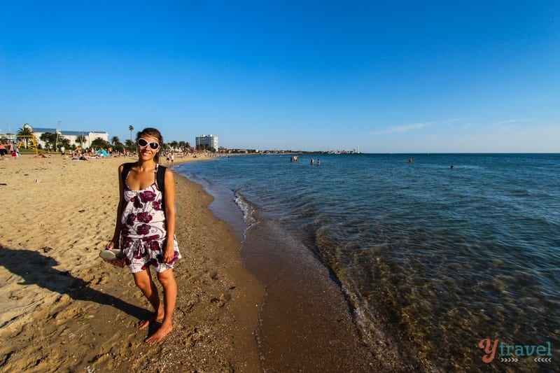 lady standing on St Kilda Beach