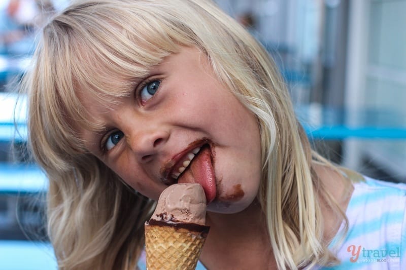 little girl eating an ice cream cone