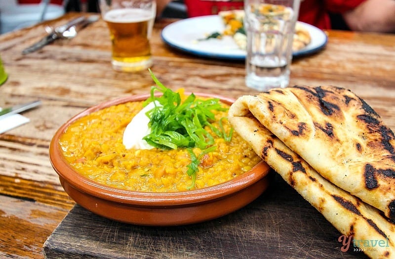 plate of dahl and nan bread