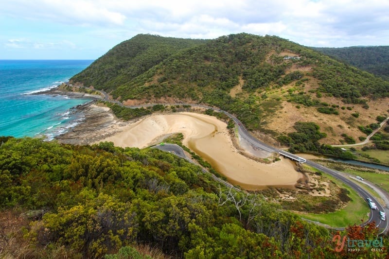 aerial view of Great Ocean Road winding around the coastline from Teddys Lookout 