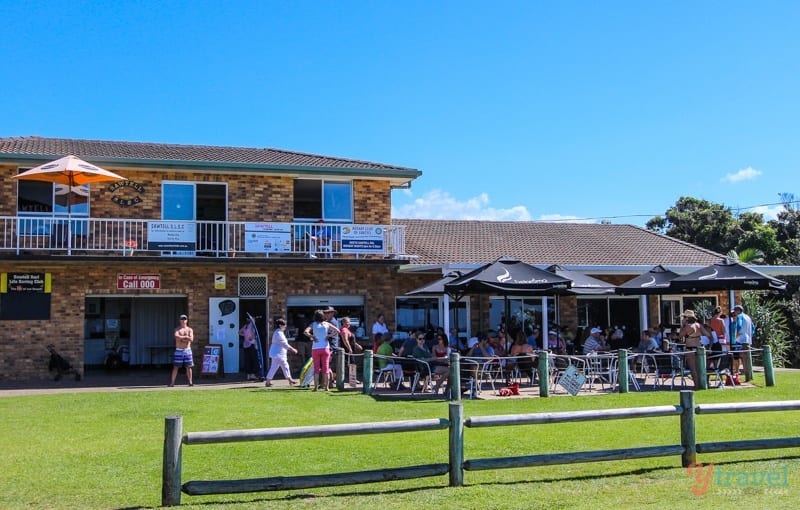 peopel sitting connected  patio of Sawtell surf club
