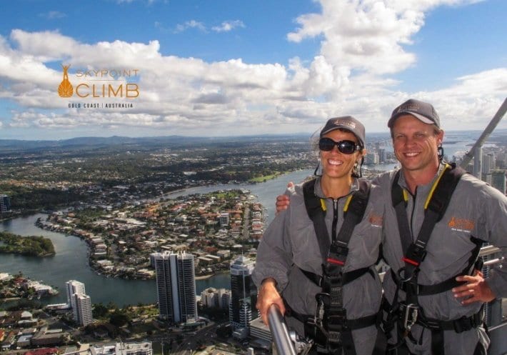 couple on the climb with views of gold coast