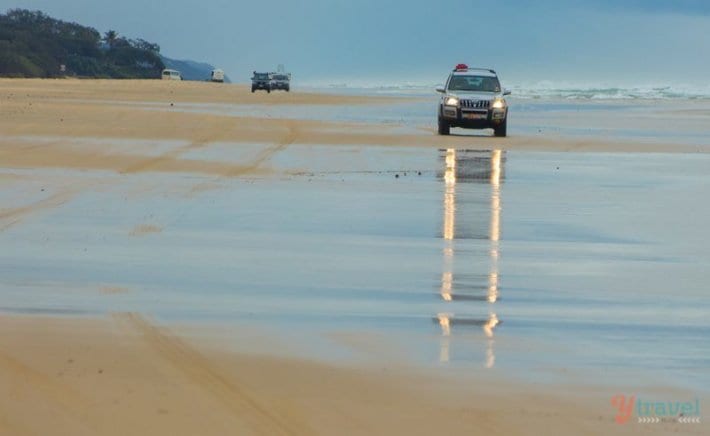 4wd driving on 75 Mile Beach on a misty day