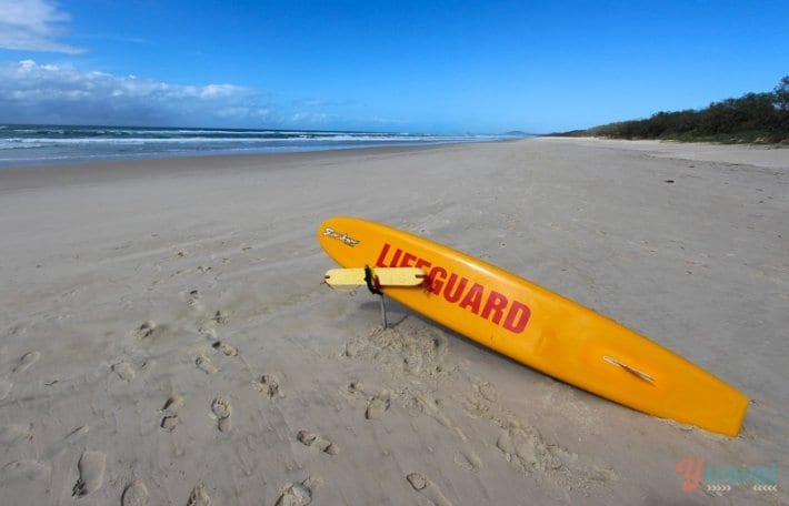 lifeguard surf board on beach