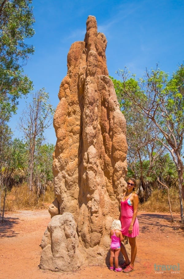 caz and savannah standing besie tall Termite Mound