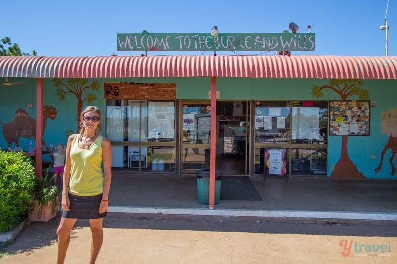woman standing out side Burke and Wills Roadhouse - 
