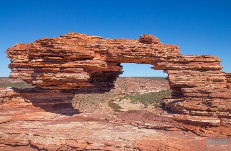 a window made naturally from rock
