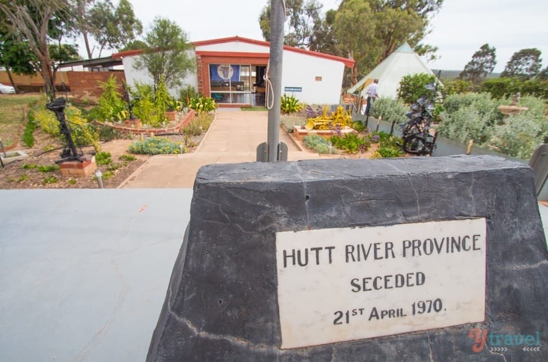 A sign on the side of the street saying hutt river province