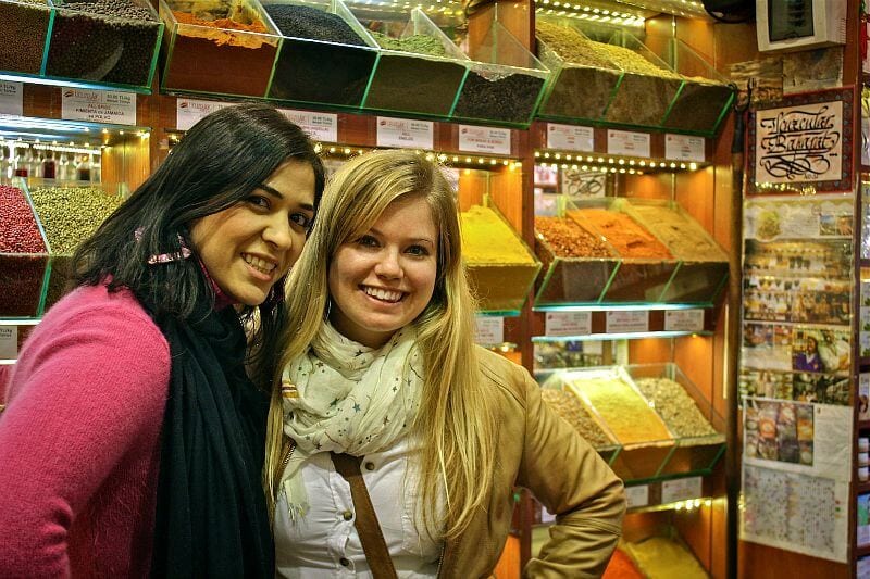 two girls standing in a spice shop Istanbul
