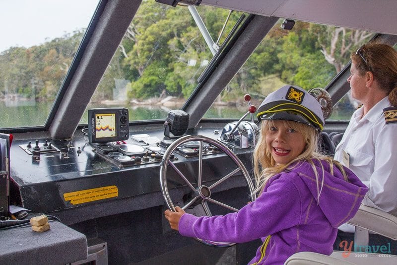 girl driving a boat