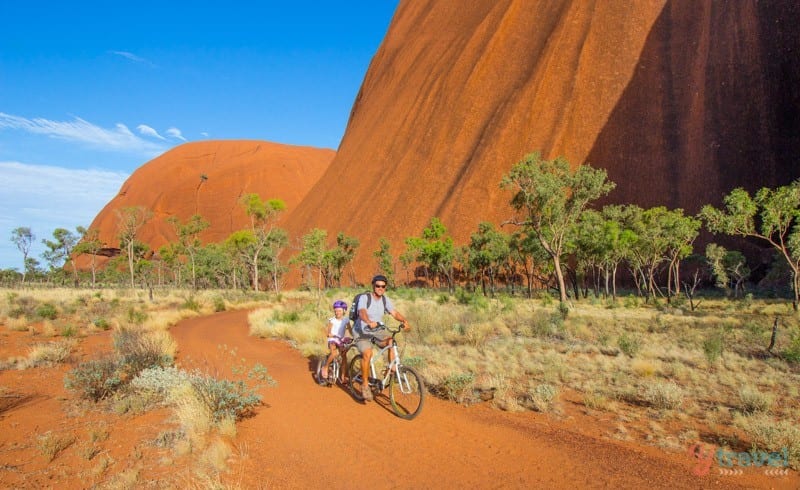craig and kalyra on tandem bikie Cycling around the base of Uluru - Northern Territory of Australia