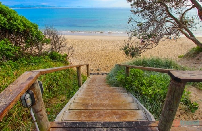 stairs leading down to clarks beach byron