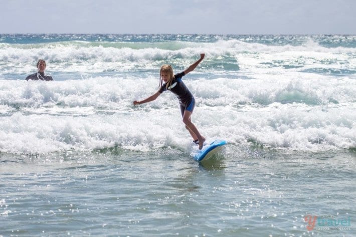 girl surfing waves