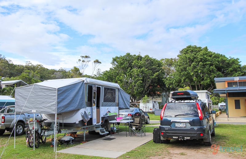caravan and car parked at Burleigh beach tourist park