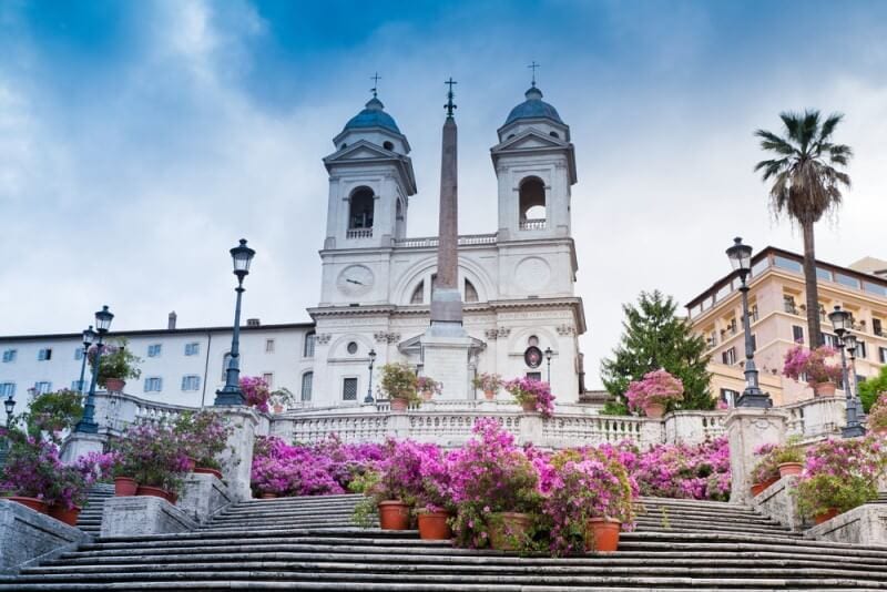 Spanish Steps Rome with  pink flowering plants on them