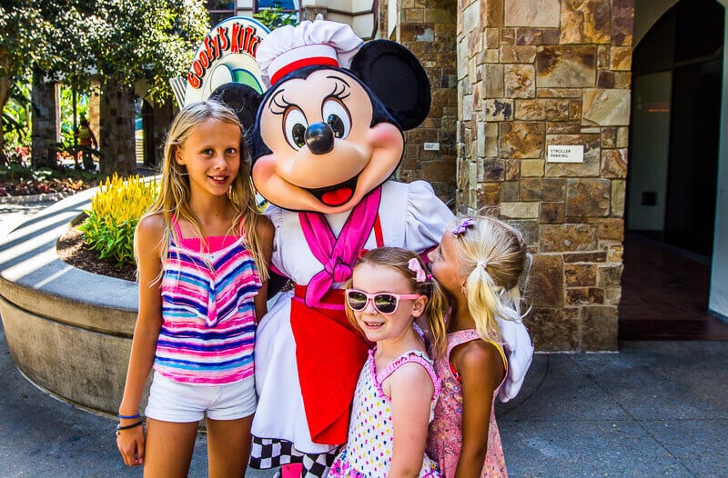 young girls posing with minnie mouse