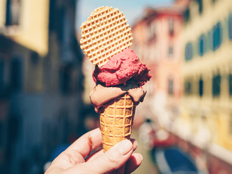hand holding a cone filled with Gelato