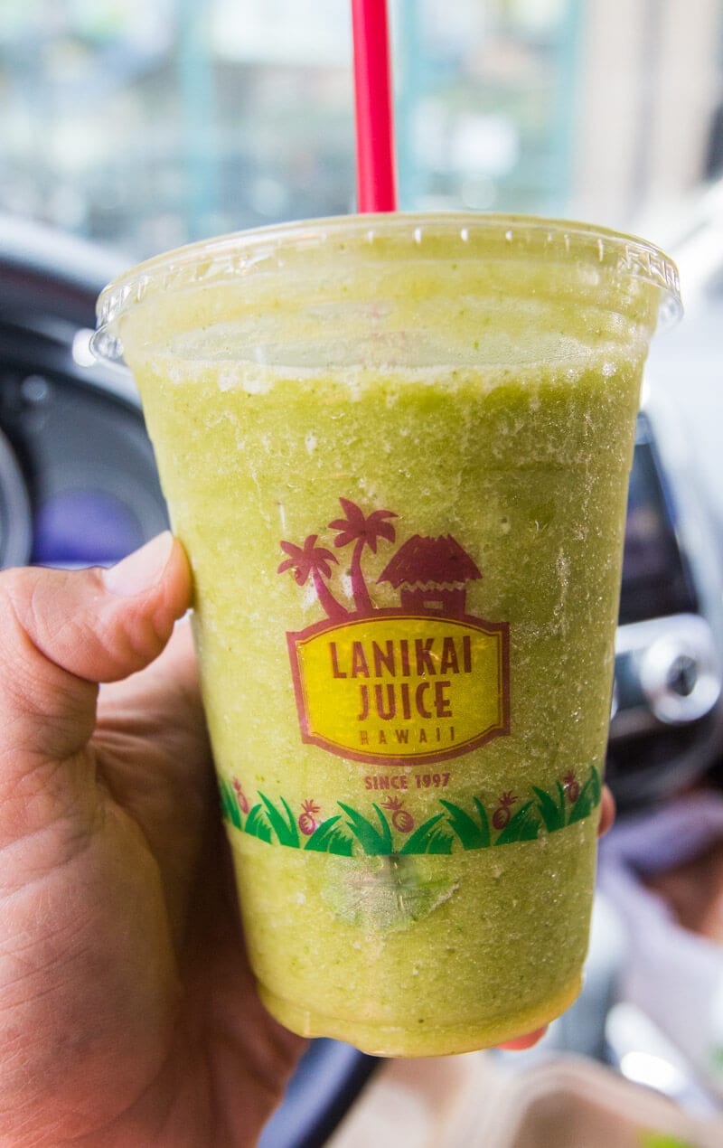 a cup of green Lanakai Juice