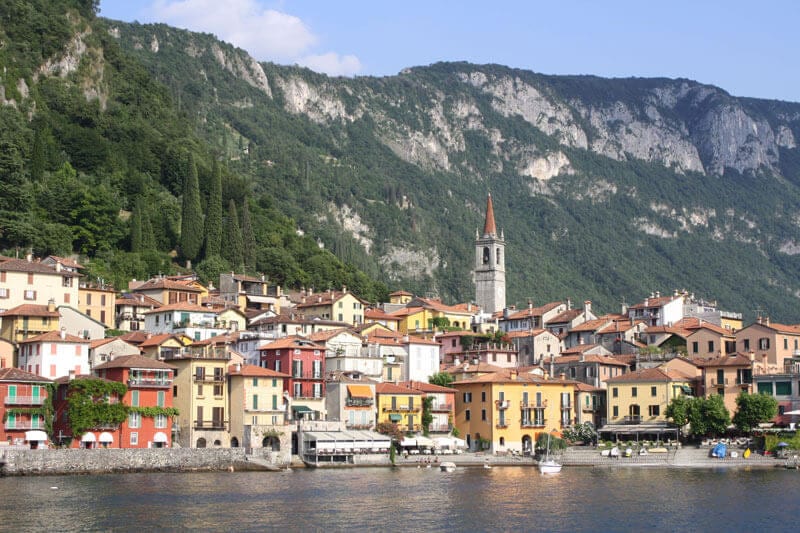 buildings of colony   varenna connected  borderline   of water  como