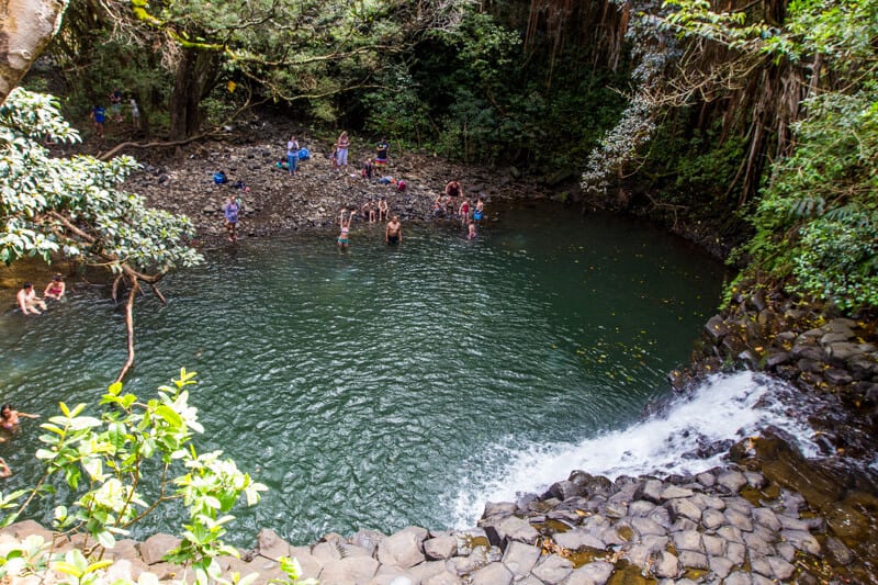 Swimming at Twin Falls on the Road to Hana drive in Maui, Hawaii 