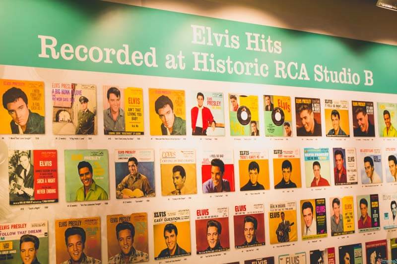 poster of elvis photos on wall