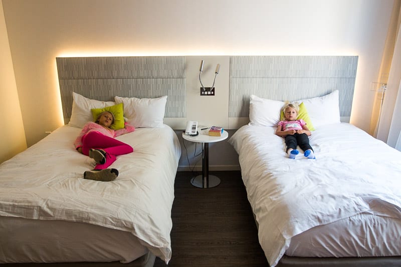 two girls lying on the beds at INNSIDE New York Nomad