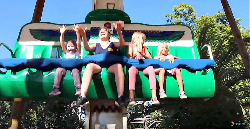 kids on a amusement park ride