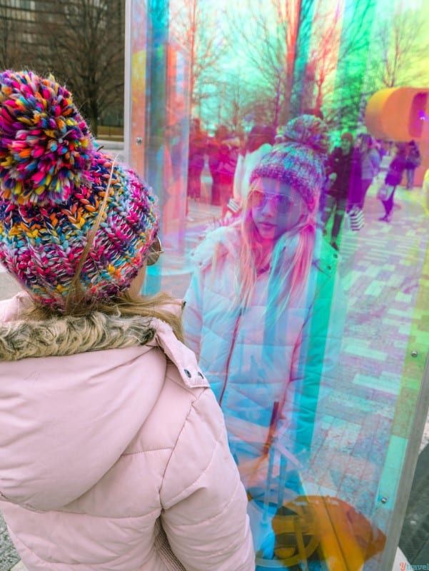 girl posing successful  Prismatica Art installation Polk Park 