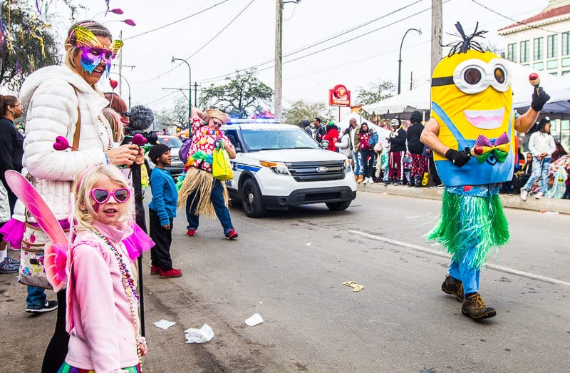 minion costume walking down street Mardi Gras in New Orleans